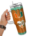 custom miami hurricanes heart helmet motif orange curved tumbler best selling.webp