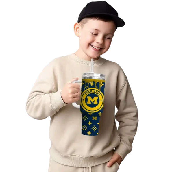 customized michigan wolverines bullseye drips blue curved tumbler latest model.webp