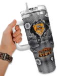 customized oklahoma state cowboys superman shield orange gray curved tumbler best selling.webp