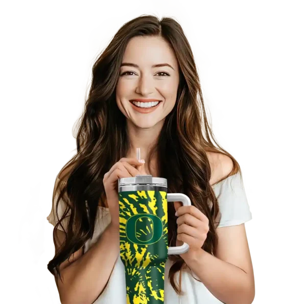 customized oregon ducks burst swirl green curved tumbler premium grade.webp