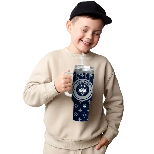 customized uconn huskies bullseye drips blue curved tumbler latest model.webp