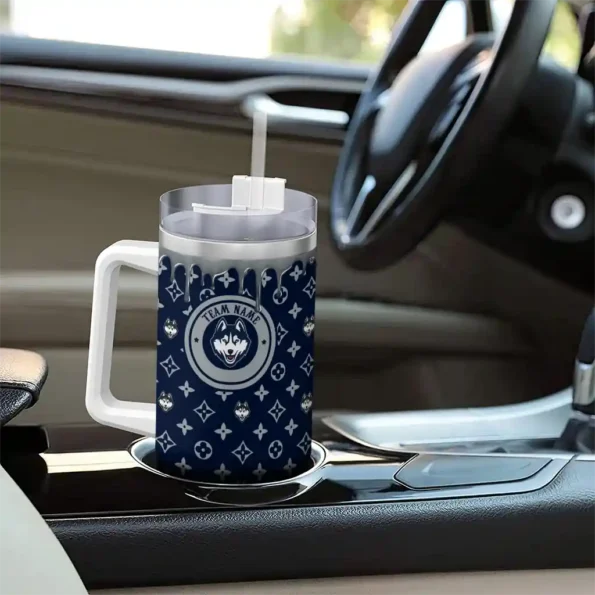 customized uconn huskies bullseye drips blue curved tumbler trendy.webp