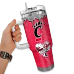 personalized-cincinnati-bearcats-heart-helmet-motif-red-curved-tumbler-best-selling.webp