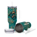 personalized-coastal-carolina-chanticleers-burst-swirl-green-curved-tumbler-best-selling.webp