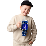 personalized-duke-blue-devils-claw-cut-blue-black-curved-tumbler-best-selling.webp