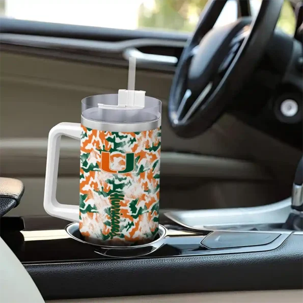 personalized miami hurricanes camo mashup orange white curved tumbler trendy.webp