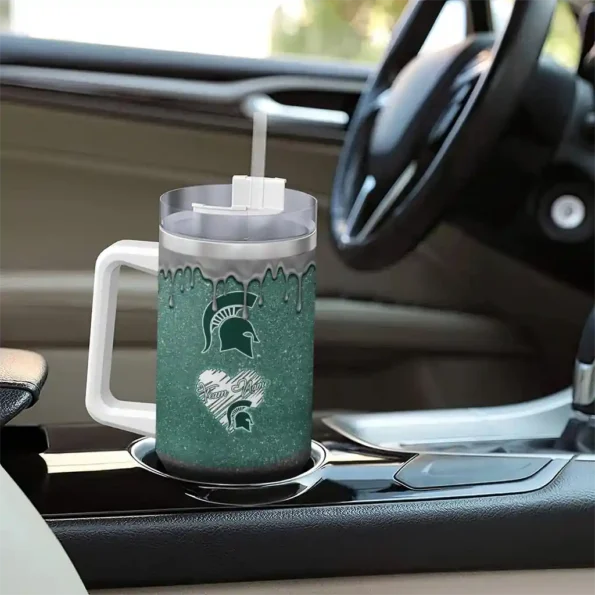 personalized michigan state spartans heart helmet motif green curved tumbler trendy.webp