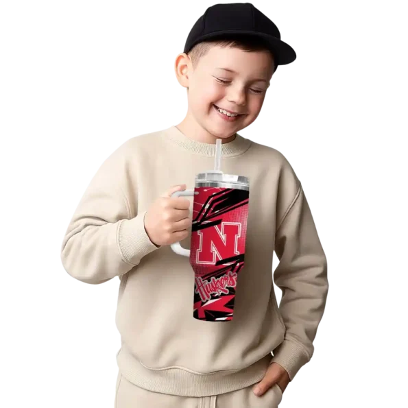 personalized nebraska cornhuskers abstract paths red curved tumbler latest model.webp