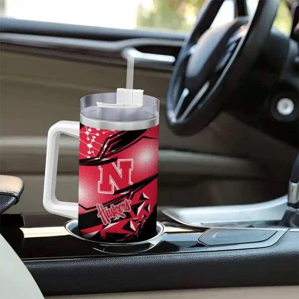 personalized nebraska cornhuskers abstract paths red curved tumbler trendy.webp