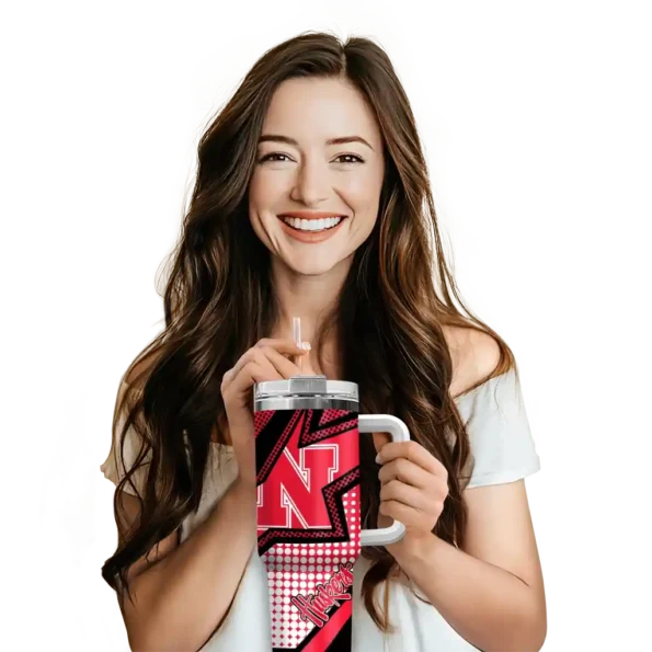 personalized nebraska cornhuskers arrow burst red curved tumbler premium grade.webp