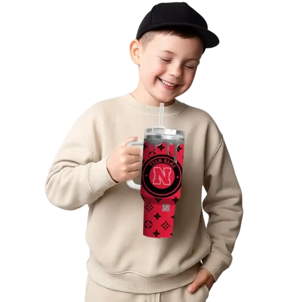 personalized nebraska cornhuskers bullseye drips red curved tumbler latest model.webp