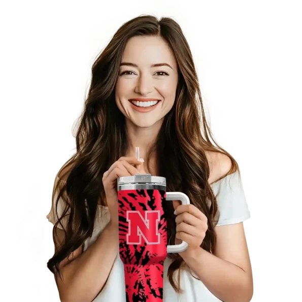 personalized nebraska cornhuskers burst swirl red curved tumbler premium grade.webp