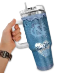 personalized-north-carolina-tar-heels-heart-helmet-motif-light-blue-curved-tumbler-best-selling.webp