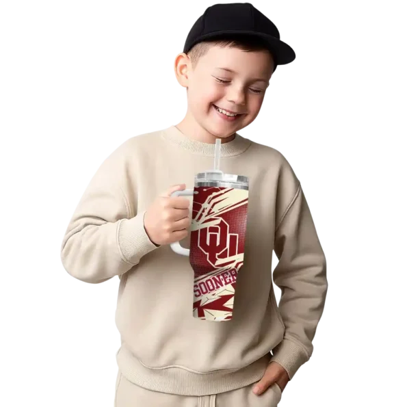 personalized oklahoma sooners abstract paths crimson curved tumbler latest model.webp