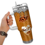 personalized oklahoma state cowboys heart helmet motif orange curved tumbler best selling.webp