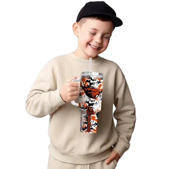 personalized oregon state beavers camo mashup orange white curved tumbler latest model.webp