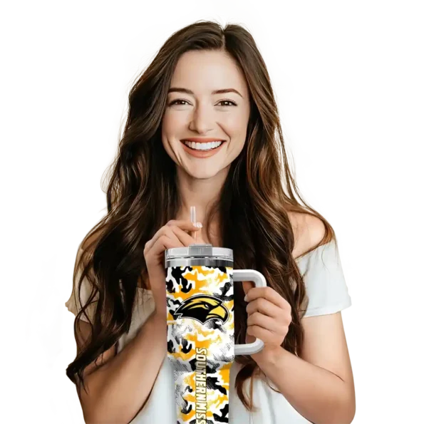 personalized southern miss golden eagles camo mashup black white curved tumbler premium grade.webp