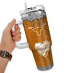 personalized texas longhorns heart helmet motif orange curved tumbler best selling.webp