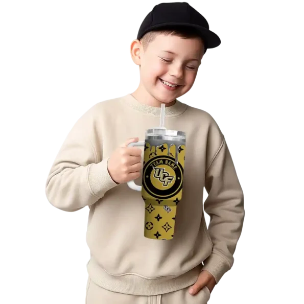 personalized ucf knights bullseye drips gold curved tumbler latest model.webp