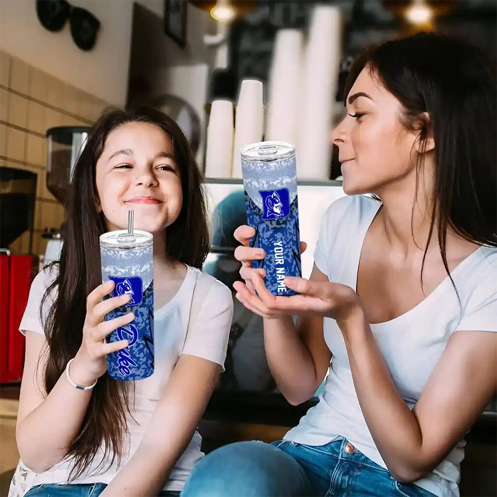 customized-duke-blue-devils-spiral-burst-print-blue-skinny-tumbler-trendy.webp