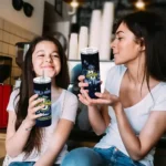 customized-marquette-golden-eagles-rose-romance-blue-black-skinny-tumbler-best-selling.webp