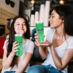 customized-marshall-thundering-herd-monogram-burst-green-white-skinny-tumbler-best-selling.webp