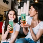 miami-hurricanes-yoda-smile-orange-skinny-tumbler-best-selling.webp