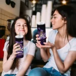 personalized-east-carolina-pirates-rose-romance-purple-black-skinny-tumbler-best-selling-1.webp