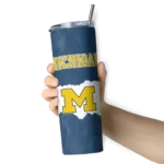 personalized-michigan-wolverines-torn-band-blue-white-skinny-tumbler-best-selling.webp