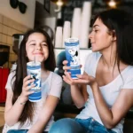 personalized-middle-tennessee-blue-raiders-snoopy-dog-blue-white-skinny-tumbler-best-selling.webp