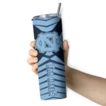 personalized-north-carolina-tar-heels-camo-texture-light-blue-skinny-tumbler-best-selling.webp