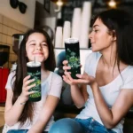 personalized-north-dakota-state-bison-rose-romance-green-black-skinny-tumbler-best-selling.webp