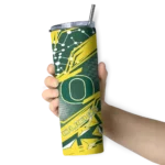 personalized-oregon-ducks-helmet-clash-green-skinny-tumbler-best-selling.webp